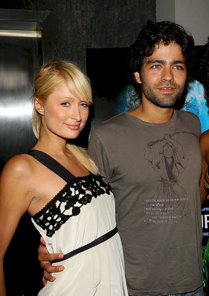 Image Credits: Getty Images / Michael Tran / FilmMagic | Socialite Paris Hilton and Actor Adrian Grenier arrives at the "11th Hour" Screening at Harmony Gold Theater on August 9, 2007 in Hollywood, California.