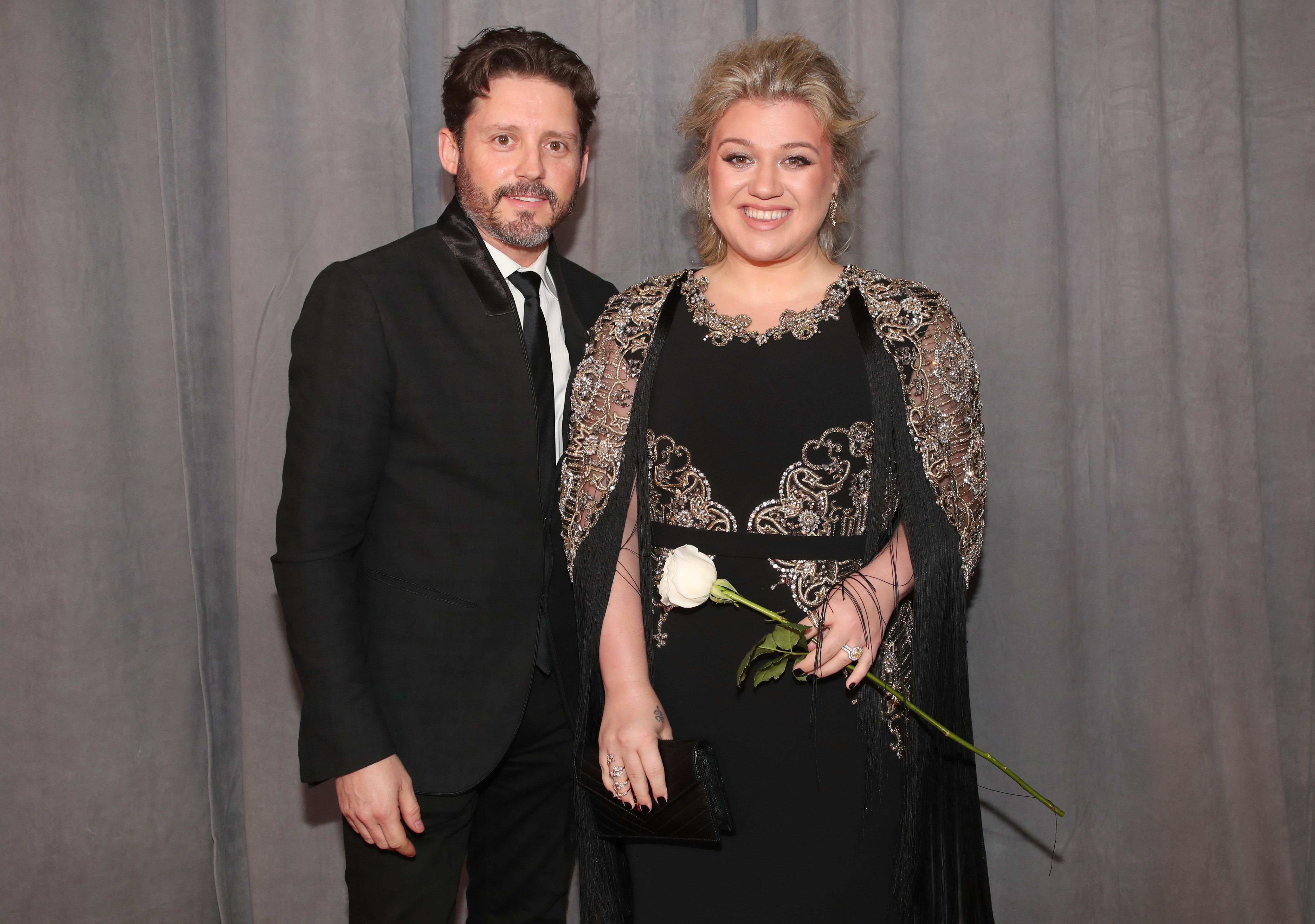Nobody knows if Kelly's divorce will have any influence on Blake and Brandon's collaboration / Getty Images
