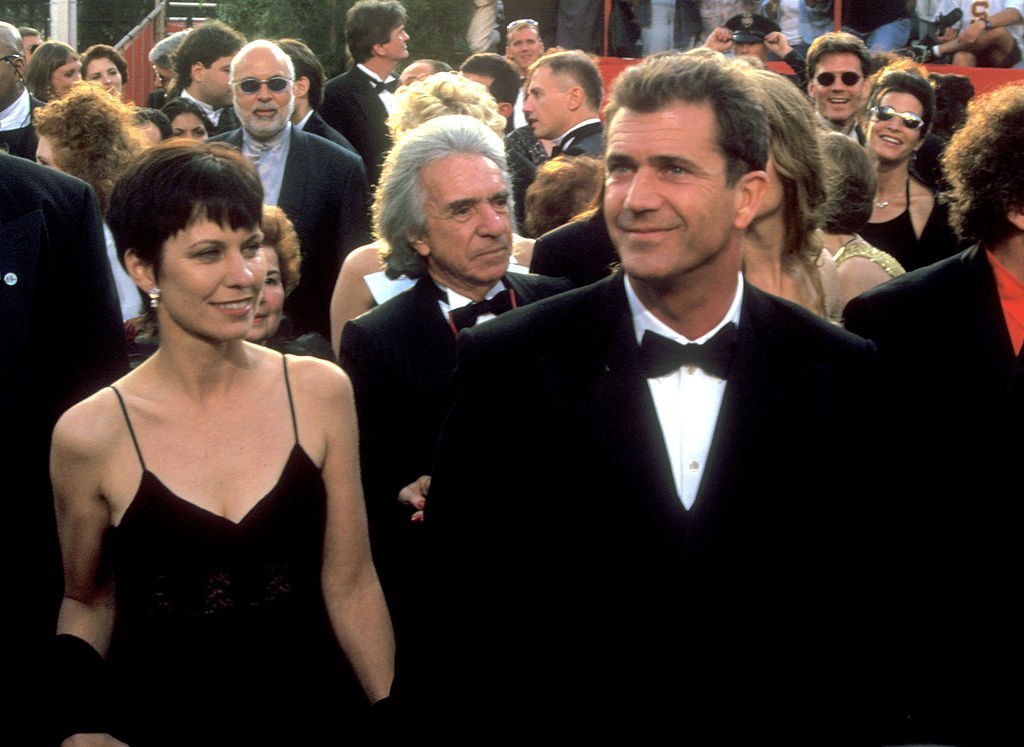 Image Credit: Getty Images / Mel Gibson (right) and wife Robyn arrive at The 69th Annual Academy Awards.