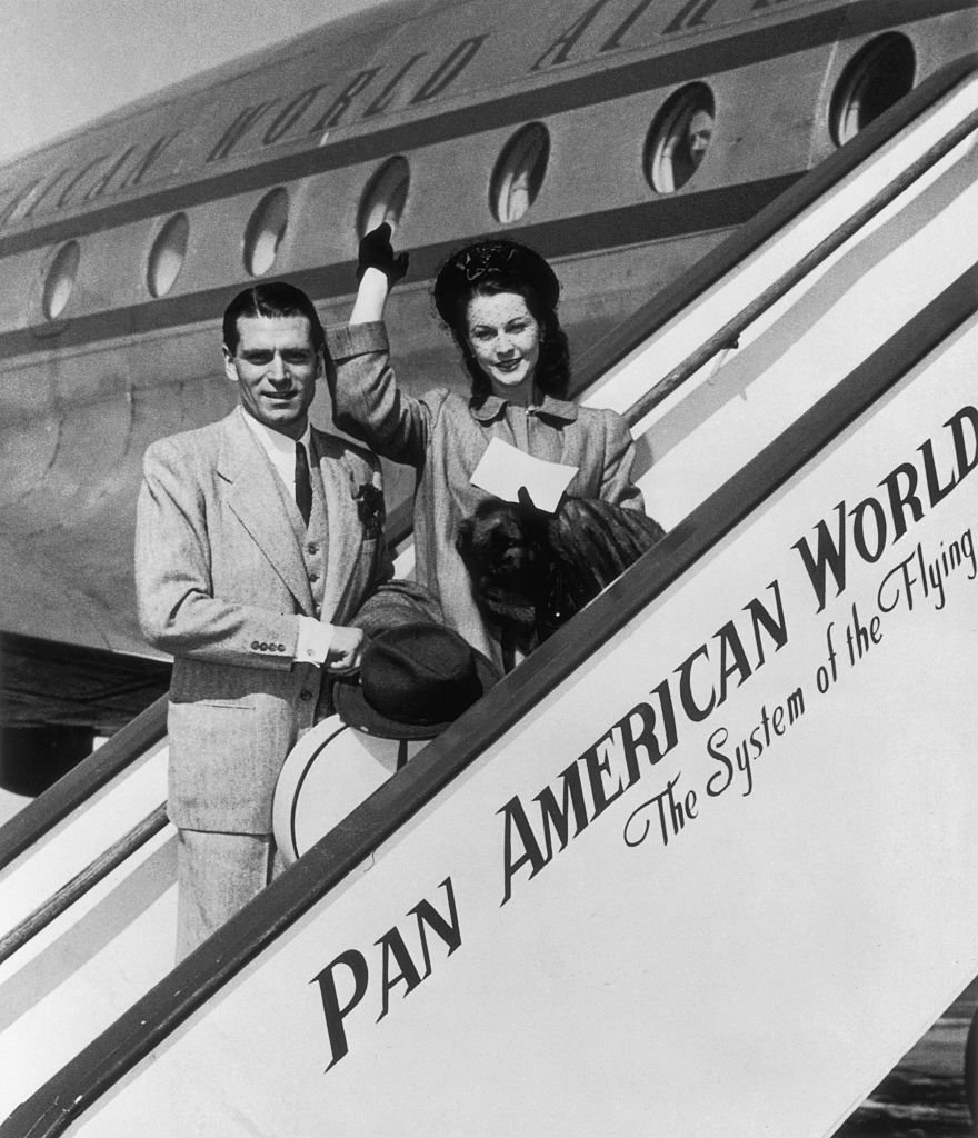 Image Credits: Getty Images / Bettmann | Olivier and Leigh boarding a plane