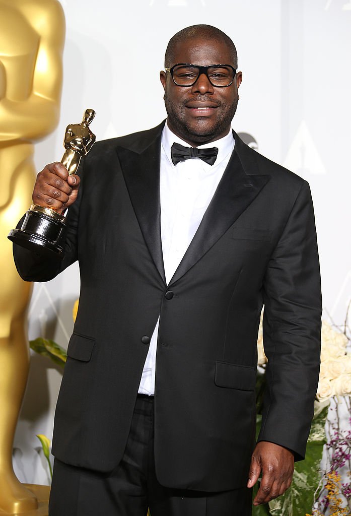 Image Credits: Getty Images / Dan MacMedan/WireImage | Director Steve McQueen poses in the press room