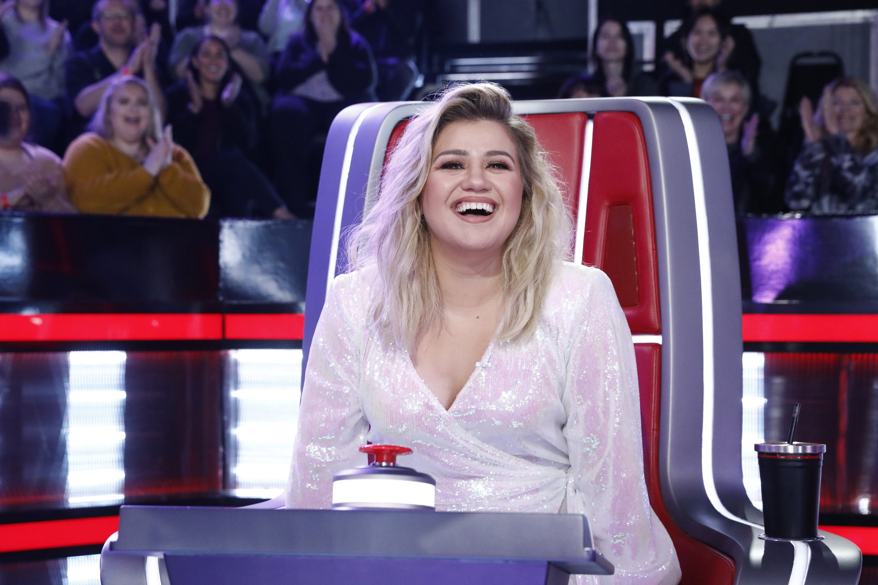 Image Credits: Getty Images | Kelly as a judge on "The Voice"