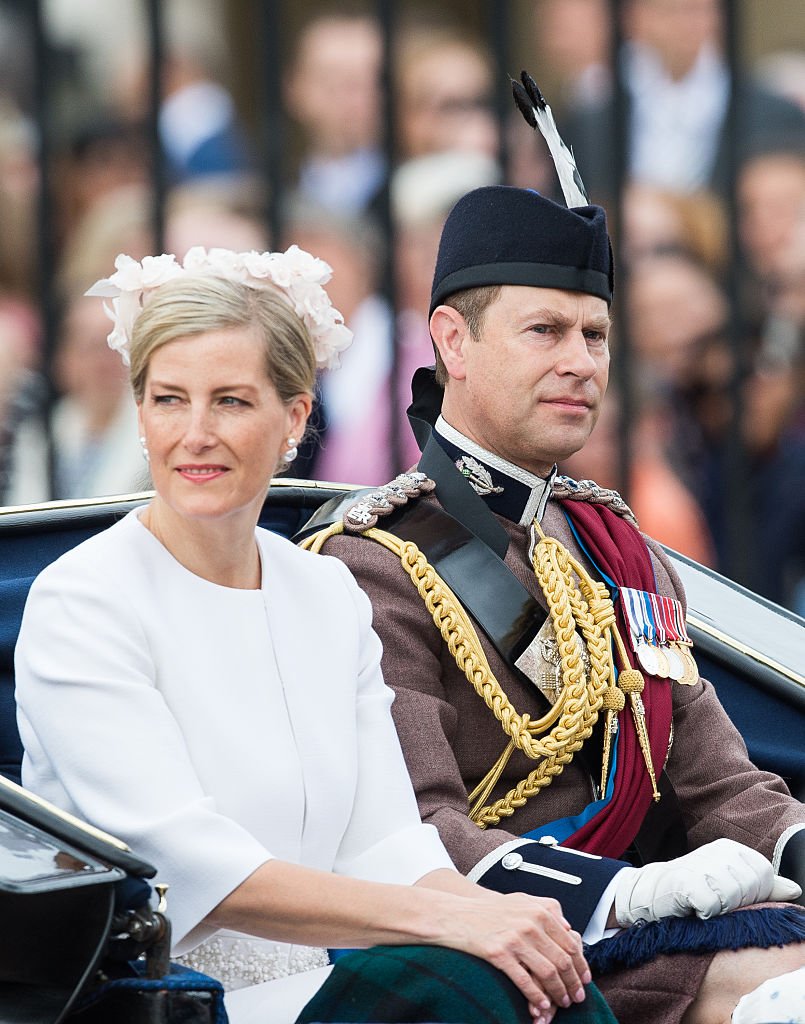 Image Credit: Getty Images / Prince Edward, Earl of Wessex and Sophie, Countess of Wessex ride by carriage during the Trooping the Colour, this year marking the Queen's official 90th birthday at The Mall on June 11, 2016 in London.