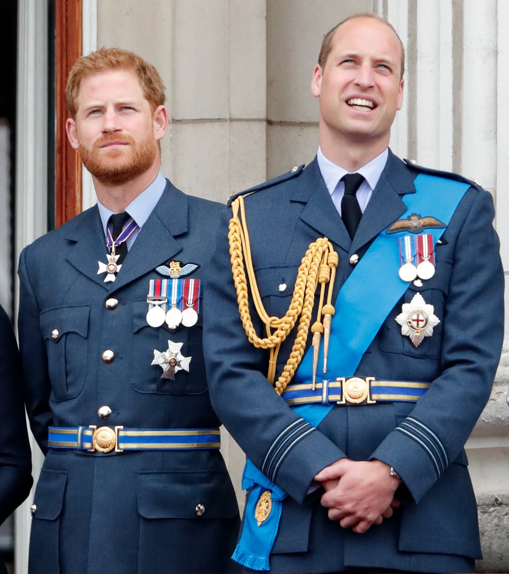 Image Credits: Getty Images / Max Mumby / Indigo | Prince Harry, Duke of Sussex and Prince William, Duke of Cambridge watch a flypast to mark the centenary of the Royal Air Force from the balcony of Buckingham Palace on July 10, 2018 in London, England. The 100th birthday of the RAF, which was founded on on 1 April 1918, was marked with a centenary parade with the presentation of a new Queen's Colour and flypast of 100 aircraft over Buckingham Palace.