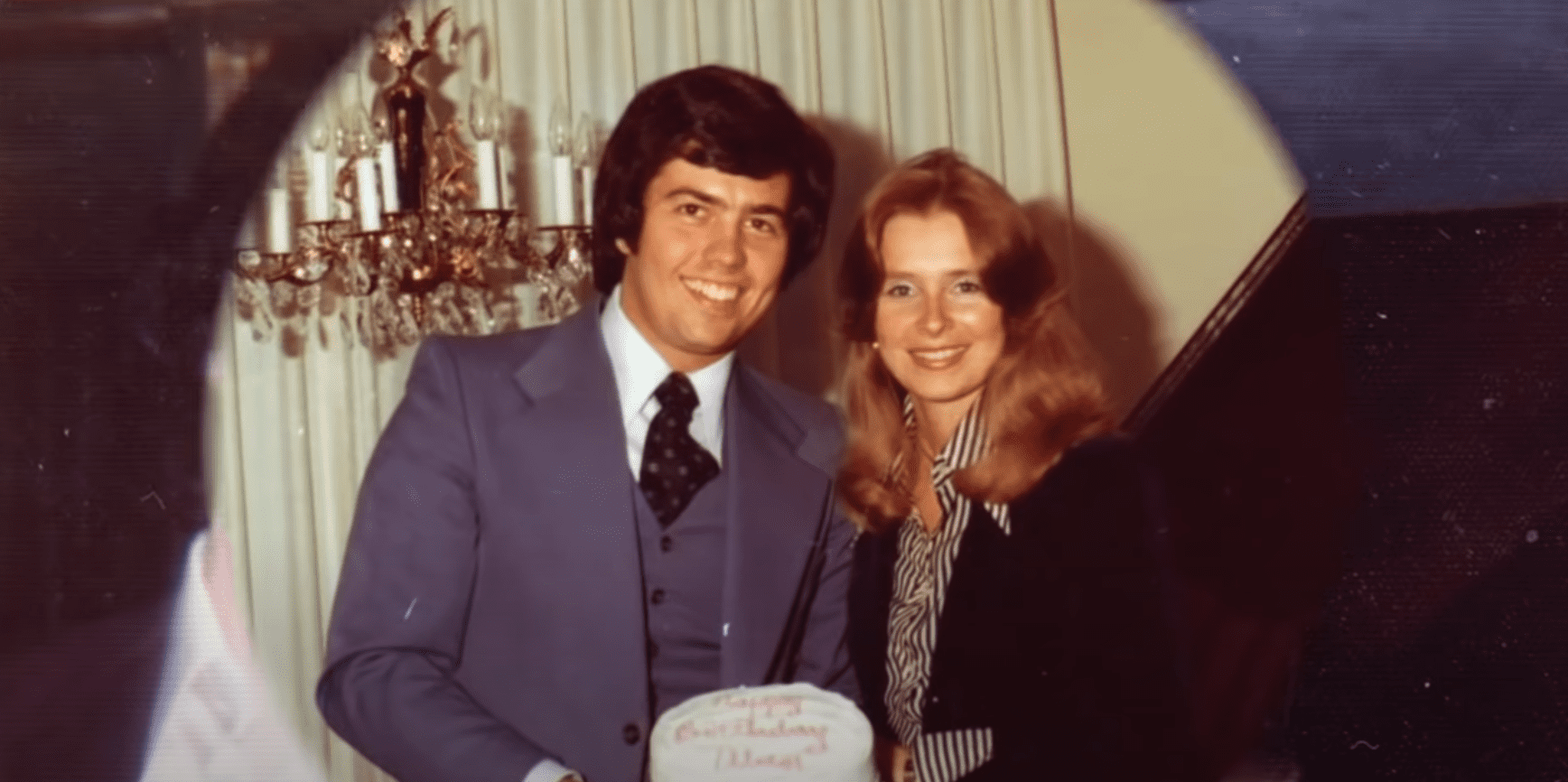 Image Source:Youtube/Nathan Osmond| Nathan and wife Suzanne taking a photo together