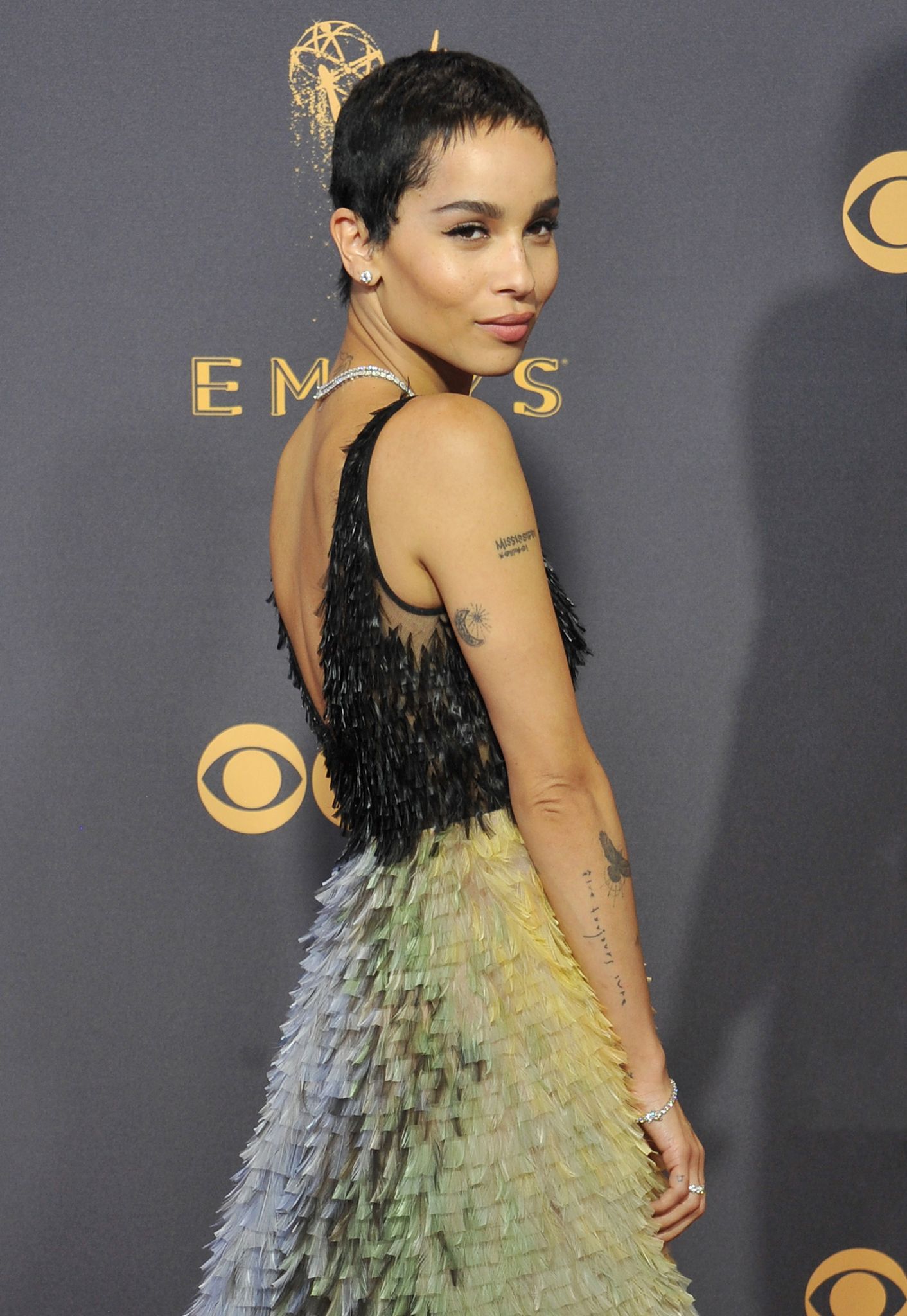 Zoe Kravitz and Jason Momoa have matching arm tattoos / Getty Images