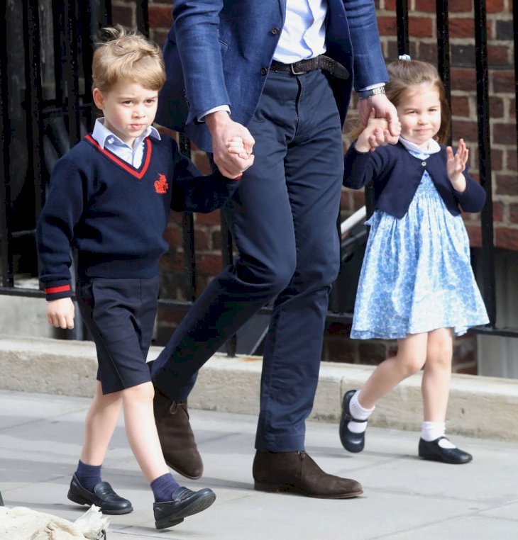 Image Credit: Getty Images / Prince William, Duke of Cambridge arrives with Prince George and Princess Charlotte at the Lindo Wing.