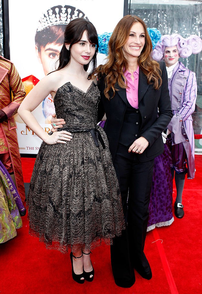 Image Source: Getty Images/Jeff Vespa/ Actresses Lily Collins (L) and Julia Roberts attend the "Mirror Mirror" premiere at Grauman's Chinese Theatre on March 17, 2012 in Hollywood, California Image Source: Getty Images/Jeff Vespa/ Actresses Lily Collins (L) and Julia Roberts attend the "Mirror Mirror" premiere at Grauman's Chinese Theatre on March 17, 2012 in Hollywood, California