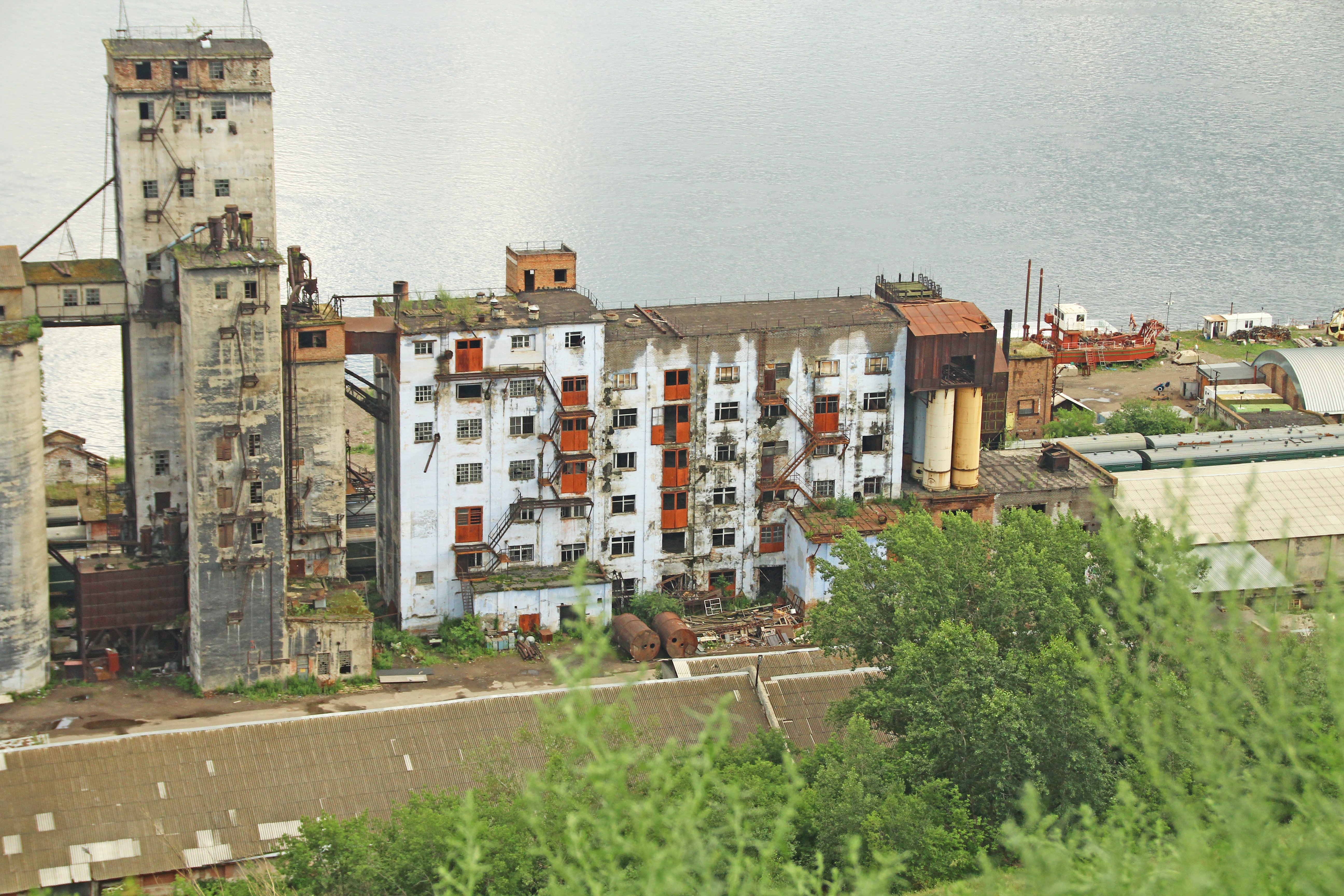 Abandoned and destroyed industrial building | Shutterstock