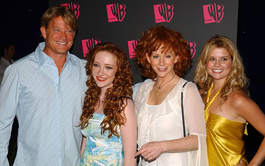 Image Credit: Getty Images / The WB Network's 2004 All Star Summer Party - Arrivals include Christopher Rich, Scarlett Pomers, Reba McEntire and JoAnna Garcia.