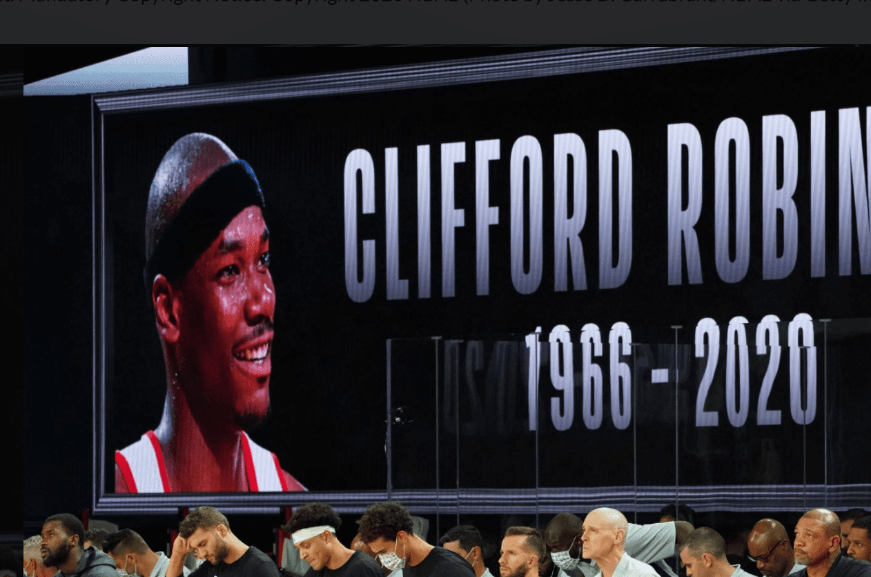 Image Credit: Getty Images / A moment of silence for Clifford Robinson prior to a game between the LA Clippers and the Dallas Mavericks.