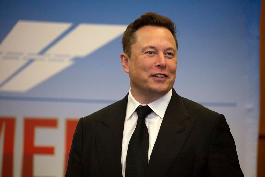 Image Credit: Getty Images / Elon Musk, founder and CEO of SpaceX, participates in a press conference at the Kennedy Space Center on May 27, 2020 in Cape Canaveral, Florida.
