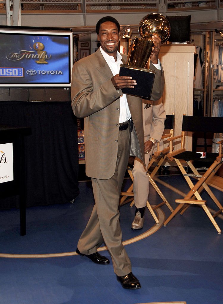 Image Credits: Getty Images / Jemal Countess / WireImage | Scottie Pippen with The 2006 NBA Finals Trophy during NBA Legends Scottie Pippen and Walt "Clyde" Frazier Announce 2006 Finals Trophy Tour at NBA Store in New York City, New York, United States.