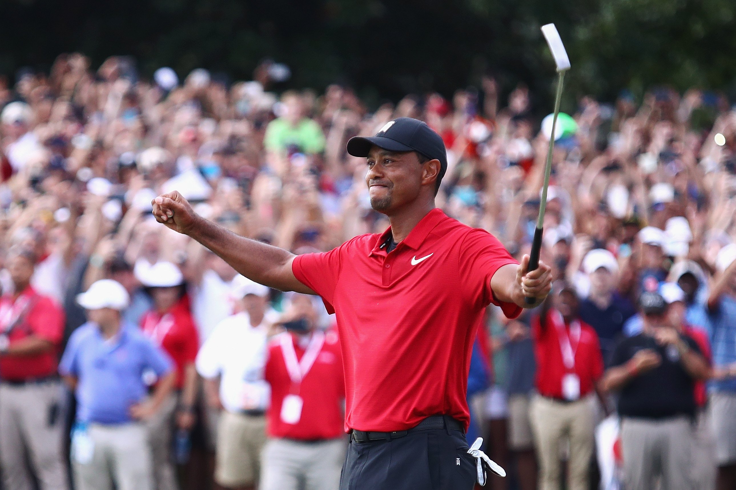 Image Credits: Getty Images / Tim Bradbury | Tiger Woods of the United States celebrates making a par on the 18th green to win the TOUR Championship at East Lake Golf Club on September 23, 2018 in Atlanta, Georgia. Image Credits: Getty Images / Tim Bradbury | Tiger Woods of the United States celebrates making a par on the 18th green to win the TOUR Championship at East Lake Golf Club on September 23, 2018 in Atlanta, Georgia.
