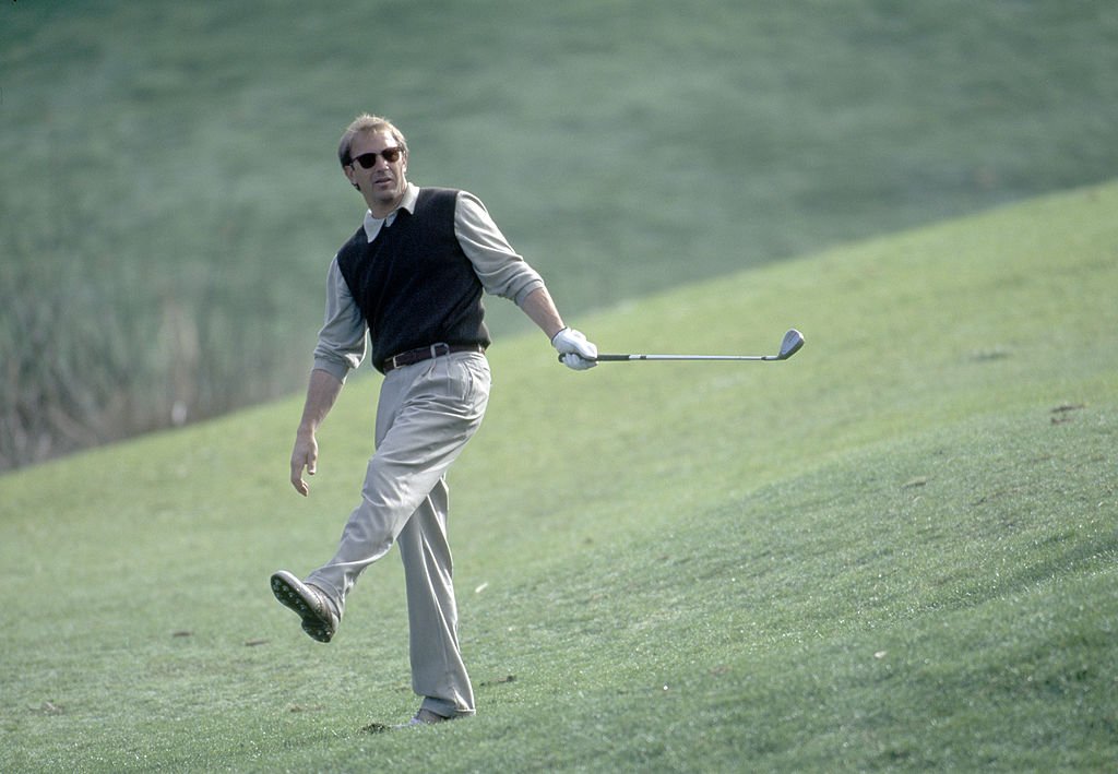 Image Credit: Getty Images / Actor Kevin Costner in action during the AT&T Pebble Beach National Pro-Am Golf Tournament held at the Pebble Beach Golf Links, California, circa February 1996. Image Credit: Getty Images / Actor Kevin Costner in action during the AT&T Pebble Beach National Pro-Am Golf Tournament held at the Pebble Beach Golf Links, California, circa February 1996.