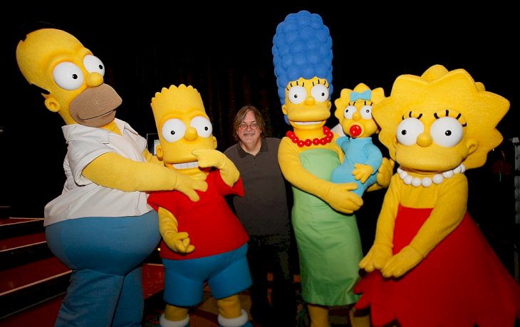 Image Credit: Getty Images/Getty Images for Fox/Michael Buckner | Creator Matt Groening poses with Simpson characters at "The Simpsons" Panel during the 2008 Comic Con