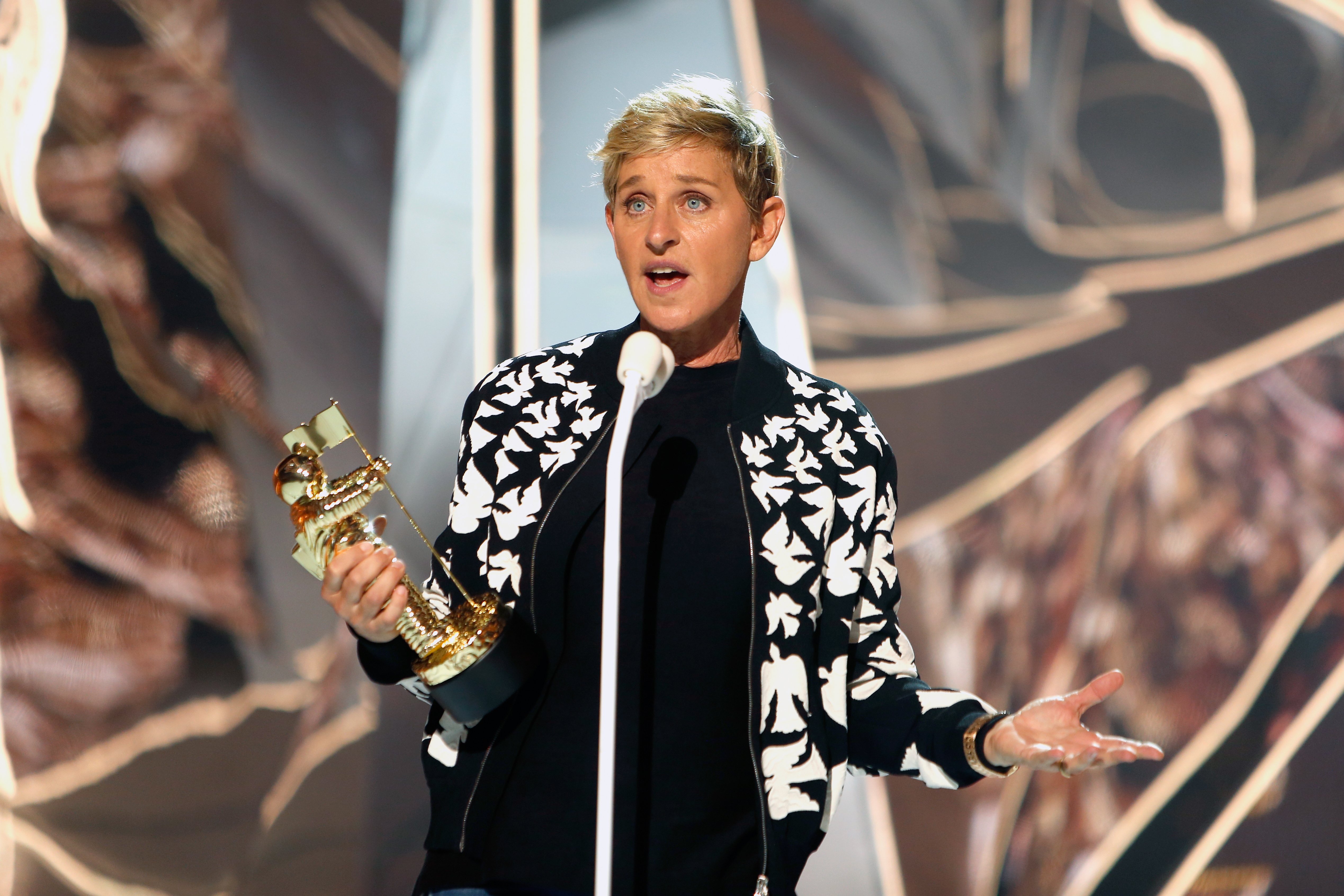 Image Source: Getty Images| Ellen DeGeneres giving a speech