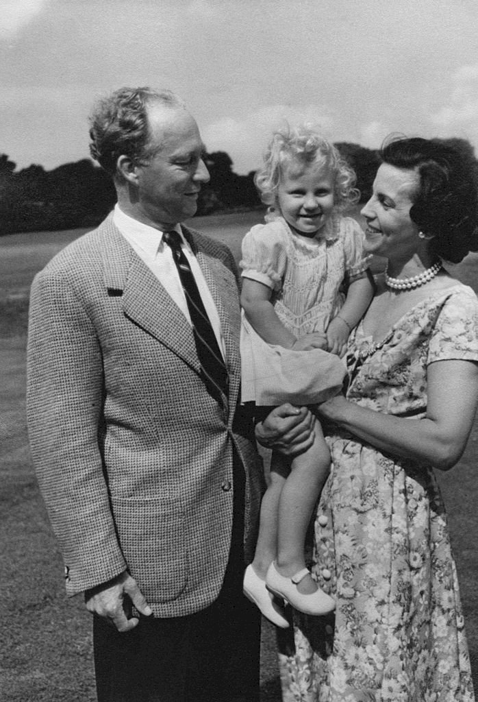 Image Credit: Getty Images / King Leopold III of Belgium (1901 - 1983) and Princess Lilian of Belgium (1916 - 2002) with their daughter Princess Marie-Christine of Belgium, in the grounds of the Royal Palace of Laeken, Brussels, circa 1954.