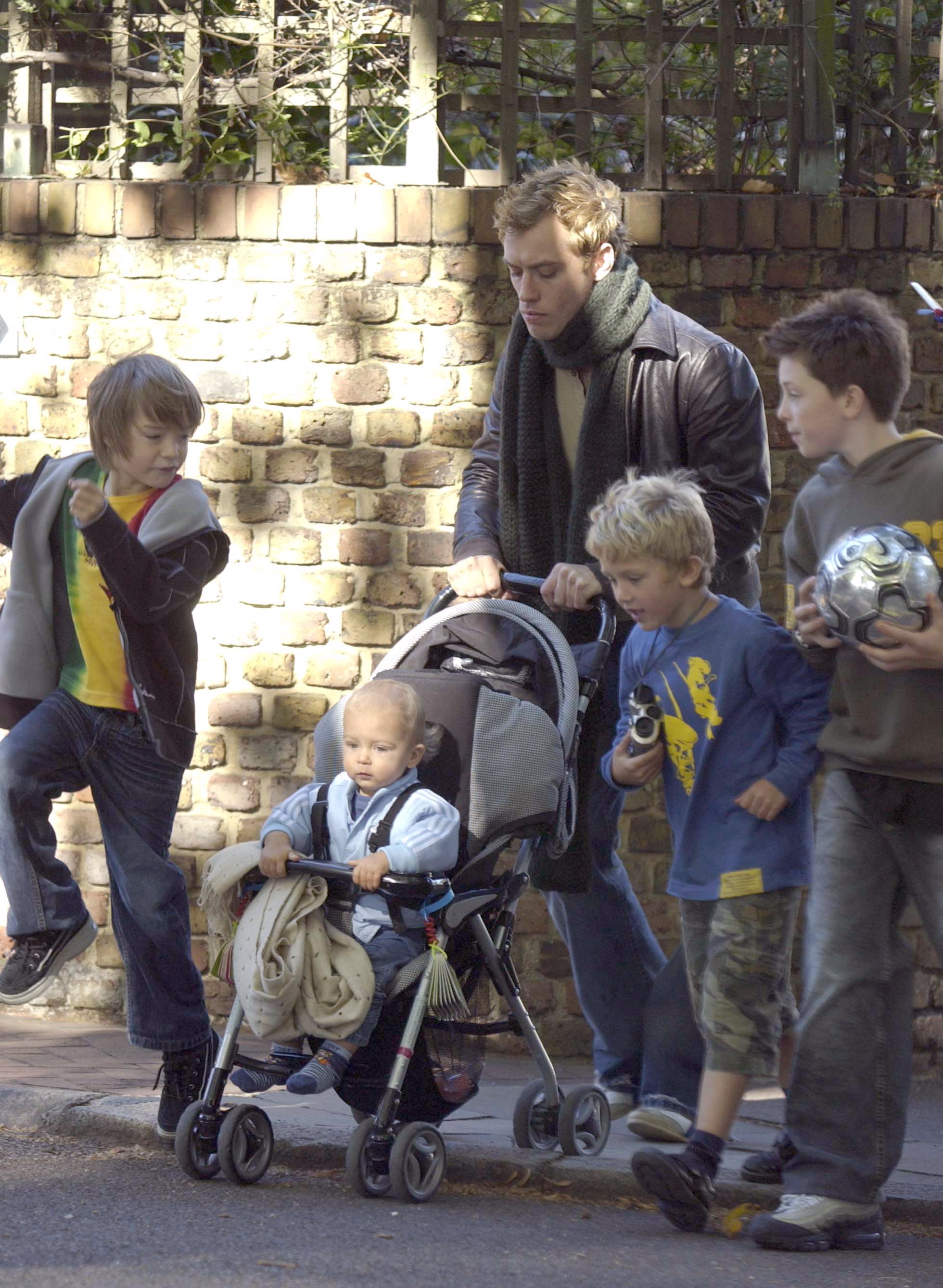 Image Source: Getty Images/Jude Law with his children