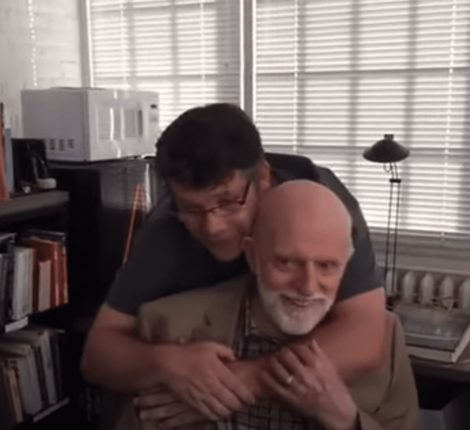 Image Source: Youtube/Run 3rd| Sean Austin hugging his dad John Astin