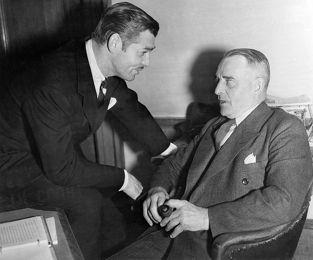 Image Credit: Getty Images / Actor Clark Gable also called The King of Hollywood poses for a picture with his father. Image Credit: Getty Images / Actor Clark Gable also called The King of Hollywood poses for a picture with his father.