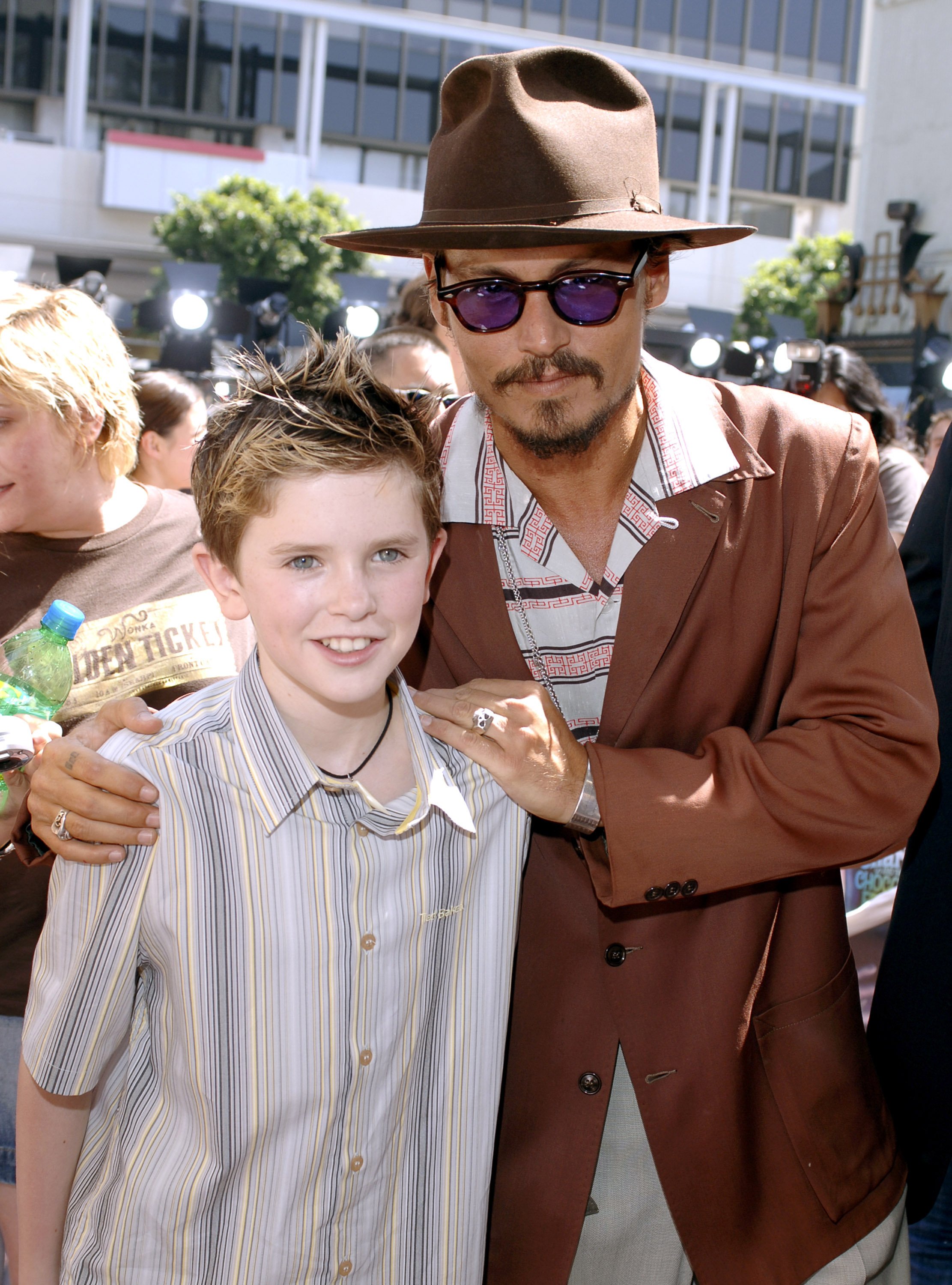 Image Credits: Getty Images / Freddie Highmore and Johnny Depp during "Charlie and the Chocolate Factory" Los Angeles Premiere