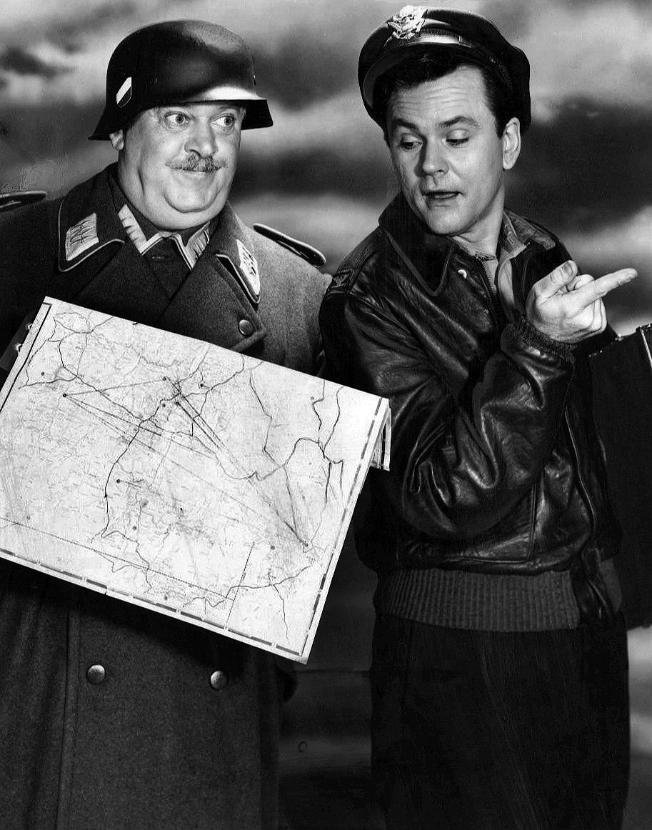 John Banner and Bob Crane | Image Source: Wikimedia Commons (Public Domain) John Banner and Bob Crane | Image Source: Wikimedia Commons (Public Domain)