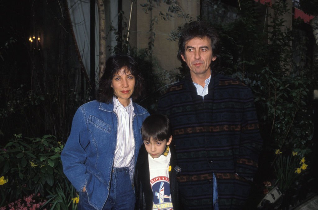 Image Credits: Getty Images / GARCIA / Gamma-Rapho | George Harrison with his wife Olivia, and their son Dhani in Paris, France.