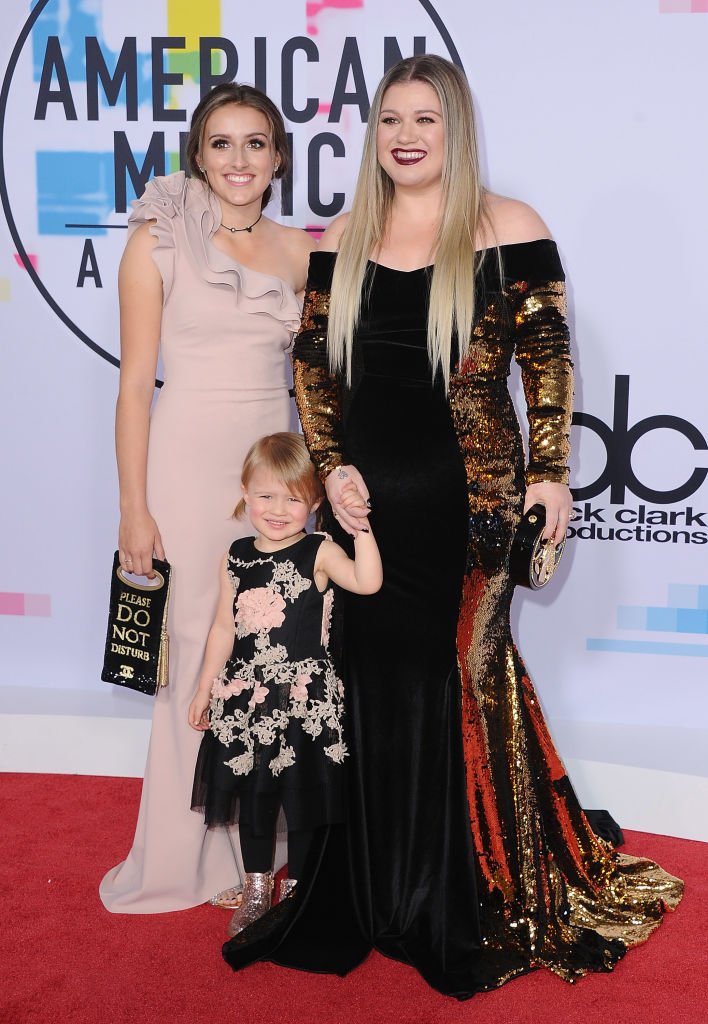 Image Credits: Getty Images / Jon Kopaloff/FilmMagic | Kelly Clarkson, daughter River Rose and stepdaughter Savannah