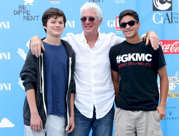 L-R Richard Gere, his son Homer James Jigme Gere (L) and a friend attend Giffoni Film Festival photocall on July 22, 2014 in Giffoni Valle Piana, Italy. (Photo by Stefania D'Alessandro/WireImage)