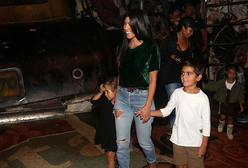 Image Credit: Getty Images / Kourtney Kardashian, Mason Disick, Penelope Disick and North West backstage at "Cats" on Broadway at The Neil Simon Theatre on September 11, 2016 in New York City.