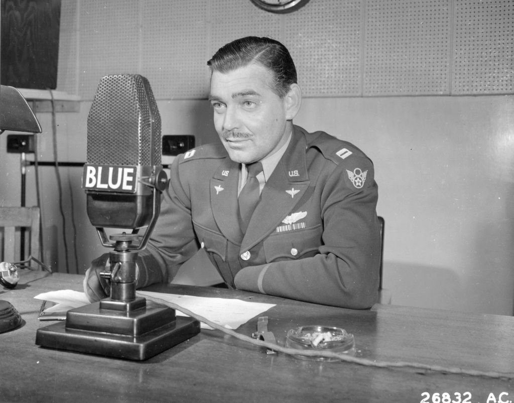 Image Credit: Getty Images / Capt Clark Gable speaks into a microphone in England, 1943. Image Credit: Getty Images / Capt Clark Gable speaks into a microphone in England, 1943.