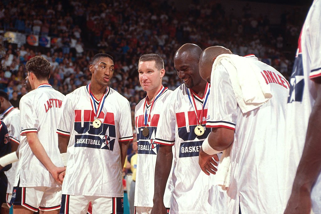 Image Credits: Getty Images / Andrew D. Bernstein / NBAE | Scottie Pippen, Chris Mullin, Michael Jordan and Charles Barkley laugh following the Gold Medal Basketball game between the United States and Croatia at the 1992 Olympics on August 8 1992 at the Palau Municipal d'Esports de badalona in Barcelona, Spain. The United States defeated Croatia 117-85 to win the gold medal.