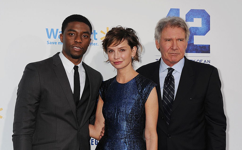Image Credits: Getty Images / Jeffrey Mayer / WireImage | Actors Chadwick Boseman, Calista Flockhart and Harrison Ford attend the '42' Los Angeles premiere at TCL Chinese Theatre on April 9, 2013 in Hollywood, California. Image Credits: Getty Images / Jeffrey Mayer / WireImage | Actors Chadwick Boseman, Calista Flockhart and Harrison Ford attend the '42' Los Angeles premiere at TCL Chinese Theatre on April 9, 2013 in Hollywood, California.